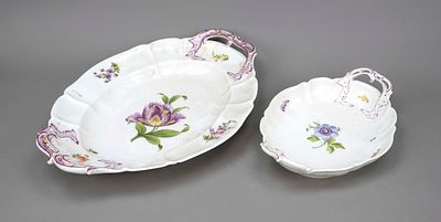 Two oval bowls, Nymphenburg, marks after 1910, curved form with rocaille handles on the sides 