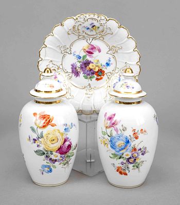 Pair of lidded vases, 20th century, ovoid shape, with polychrome floral painting and gold rims 