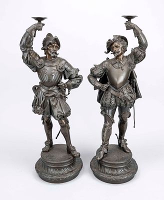 Unknown 19th-century sculptor, two large knight figures holding raised flat bowls, patinated 