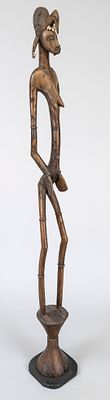 Senufo rhythm stamp, Ivory Coast, 19th/20th century, wood carved. Slender, fully sculpted 