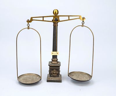 Beam scale, late 19th century. Base and shaft cast iron, partially bronzed. Beams, weighing 