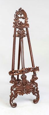 Easel, 20th century, mahogany. Openwork design with rocaille motifs, height-adjustable picture 