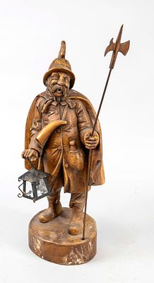 Figurative lamp, 20th century, wood. Night watchman standing on a plinth. Holding a halberd in 