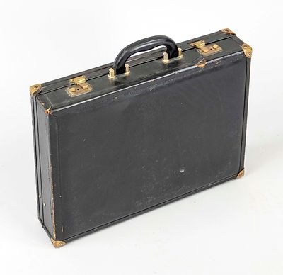 Vintage briefcase, black leather, gold-colored hardware and fittings, short central carrying 