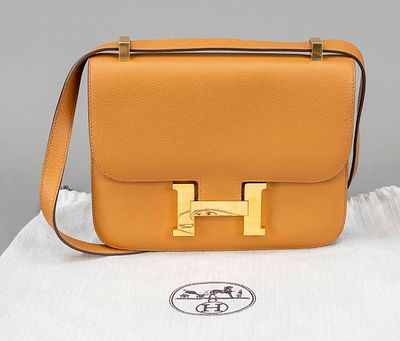Herm&egrave;s, Constance Bag, ochre-colored textured Epsom leather with dark brown contrasted edges 
