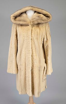 Short coat with hood, cream-colored sheared mink with texture, fastens with concealed fur hooks 