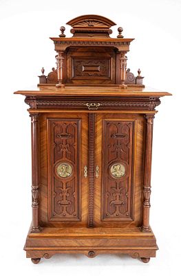 Gr&uuml;nderzeit ornate sideboard, circa 1880, walnut, 2-door body with carved panels featuring 