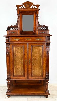 Ornate tall cabinet with top section, circa 1890, walnut, 2-door body with open shelf below 