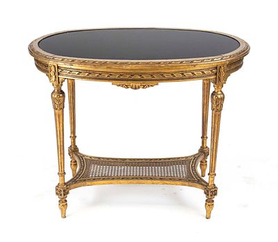 Classical-style table, circa 20th century, delicate gilded wooden frame with cane weaving 