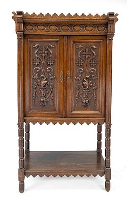 Gr&uuml;nderzeit column cabinet, circa 1880, oak, two-door body with floral carvings on the panels 