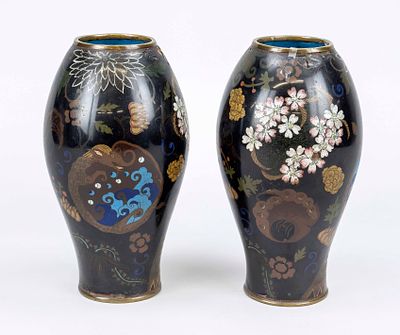 Pair of cloisonn&eacute; vases, Japan, circa 1900 (Meiji period). Scattered ornaments and flowers on a 