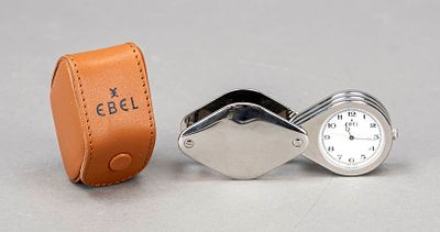 Ebel travel alarm clock in the design of a single-lens magnifying glass, marked “Loupe” Ref. 
