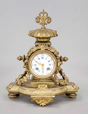 Mantel clock, France – 2nd half of the 19th century, decorated with scrollwork, crowned by a 