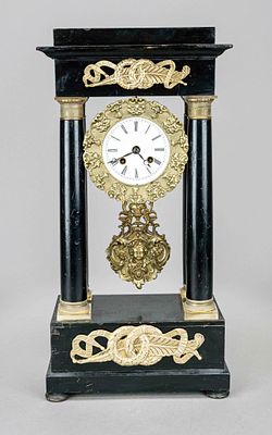 Portal clock, 2nd half of the 19th century, ebonized wood with gilded bronze appliqu&eacute;s, columns 
