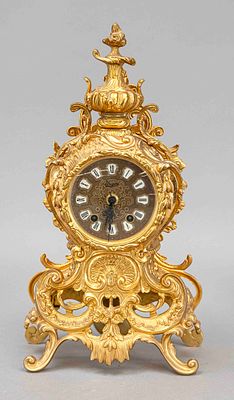 Mantel clock, Urgos, 2nd half of the 20th century, yellow cast iron, partially polished and 
