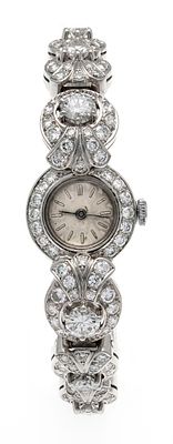 Ladies' diamond gold watch, 585/000 WG, with 67 diamonds total approx. 5.0 ct., ranging from 