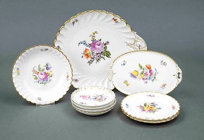 Set of 9 pieces, Nymphenburg, 20th century, ribbed form, polychrome floral painting, gold 
