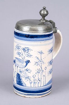 Cylindrical jug, western Germany, 19th century, faience, painted all around in underglaze blue 