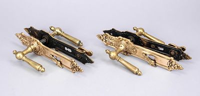 2 pairs of identical Gr&uuml;nderzeit door handle sets, second half of the 19th century, brass. 