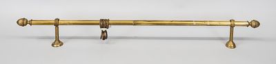 Curtain rod, late 19th/early 20th century, brass. Rod with ornamented finials, 2 wall brackets 