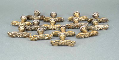 14 Art Nouveau window handles, ca. 1900, profiled and ornamented brass, width 9 cm each