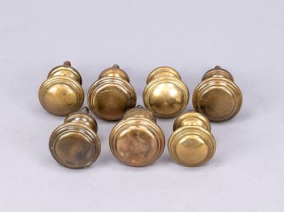 7 door or furniture knobs, 2nd half of the 19th century, brass/bronze. Round disc shape 