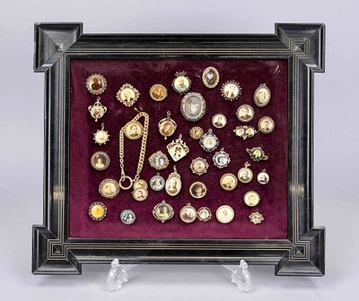 40 brooches and pendants with small portrait photographs, late 19th and early 20th centuries 