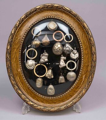 14 baby rattles, 19th and 20th centuries, various materials and designs, metal with plastic or 