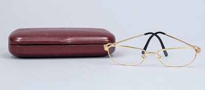 Cartier, reading glasses, narrow gold-colored metal frame, delicate temples, lenses with 