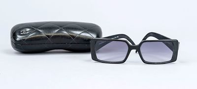 Chanel, sunglasses, black plastic frame with wide temples, gray-tinted lenses with a slight 