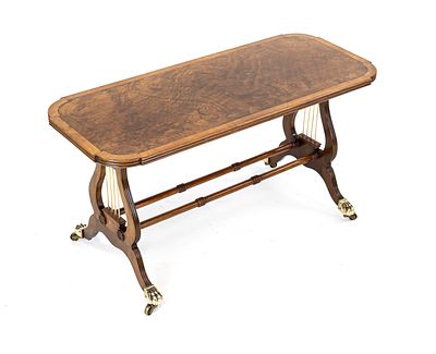 Side tables on casters, 20th century, burl walnut, lyre-shaped side frames, brass paw feet on 