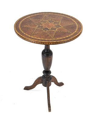 Side table, circa 1900, walnut and other woods veneered and inlaid in a star pattern, H. 71 cm 