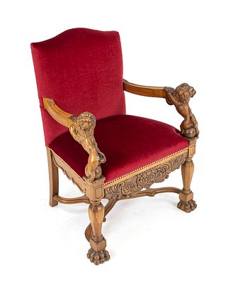 Ornate armchair, circa 1880, walnut, armrests shaped as lions carved in the full-relief style 