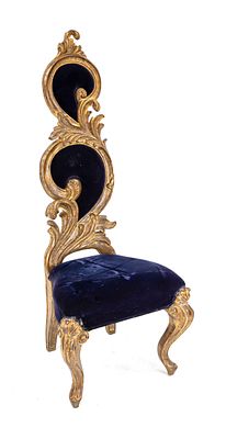 Ornate chair, 20th century, carved and gilded wood, 158 x 64 x 57 cm., The furniture is located 
