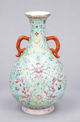 Turquoise-ground famille rose vase, China. Lotus blossoms and tendrils and mirrored dragons 