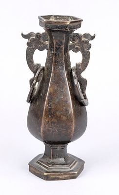 Hexagonal vase, China, probably Ming period, bronze. Slightly compressed baluster shape with 