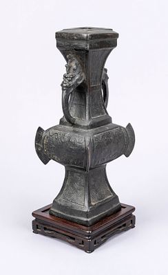 Archaic-style vase, China, bronze. Baluster on a square base, taotie reliefs, figurative 