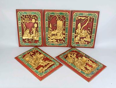 5 carved panels, China, 20th century, wood, polychrome and gilded. Worn and dented, each 66 x 44 cm
