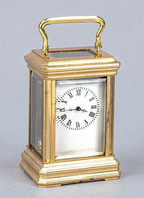 Travel alarm clock, gilded, late 20th century, faceted glass on all sides, with top-mounted 