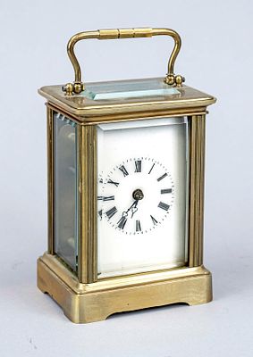 Travel alarm clock, brass with residual gilding, 20th century, faceted glass on all sides 