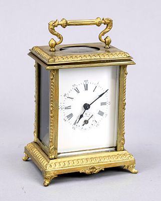 Japy Fr&egrave;res travel alarm clock, France, circa 1890, brass decorated with top-mounted handle 