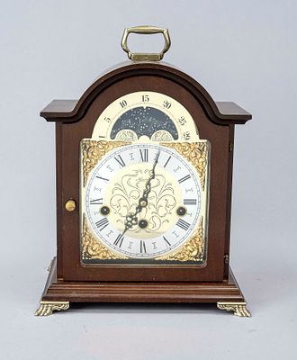 Hermle mahogany table clock, 2nd half of the 20th century, top-mounted crown, brass dial with 