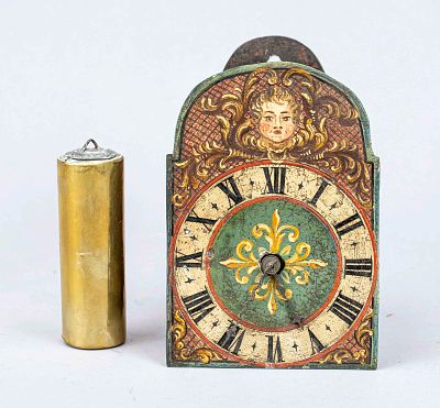 Small iron shield wall clock with 1 weight, circa 1800, dial polychromatic with a mascaron and 