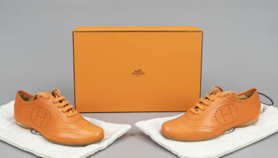 Hermes, sporty lace-up shoe, orange leather with logo perforation on the side and other 