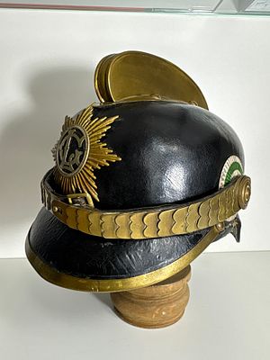 Ornate Fire Helmet Saxony – Commander's Helmet with Scale Chain & CL-Emblem – circa 1900 
