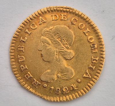 קולומביה 1 אסקודו משנת 1824
עמלה 10%. זהב 0.875 
משקל 3.3 גרם