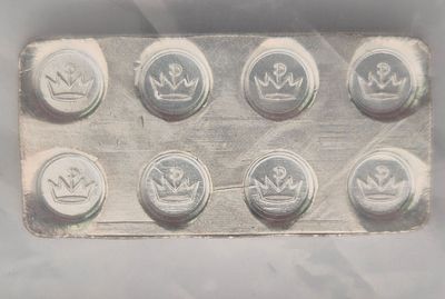 חצי אונקיה כסך באריזה של חברת APMEX. 1/2 אונקיה