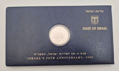 מארז של חברה למטבעות ומדליות 
מטבע כסף 2 שקלים+ שטר 50 שקלים מצב חדש+ בול כסף. כסף 0.925 
משקל 