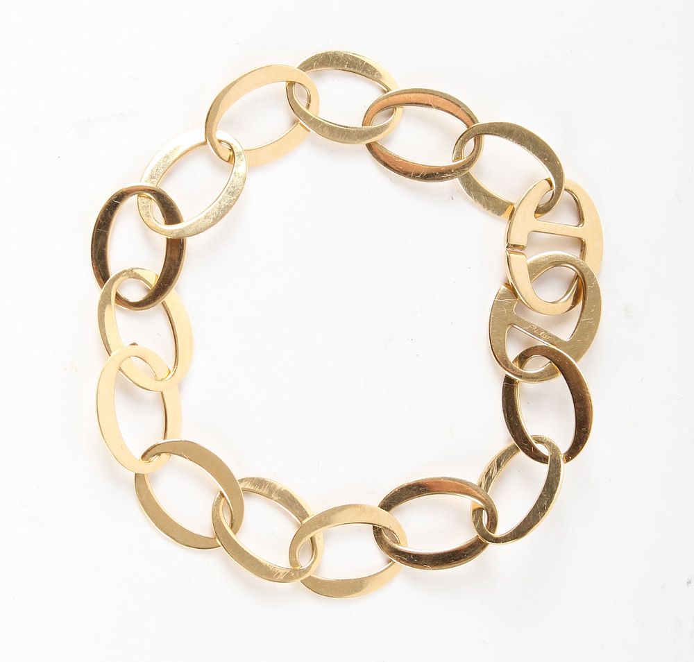 An 18K Gold Link Bracelet Made In Germany. Description: An 18k gold link bracelet made in 