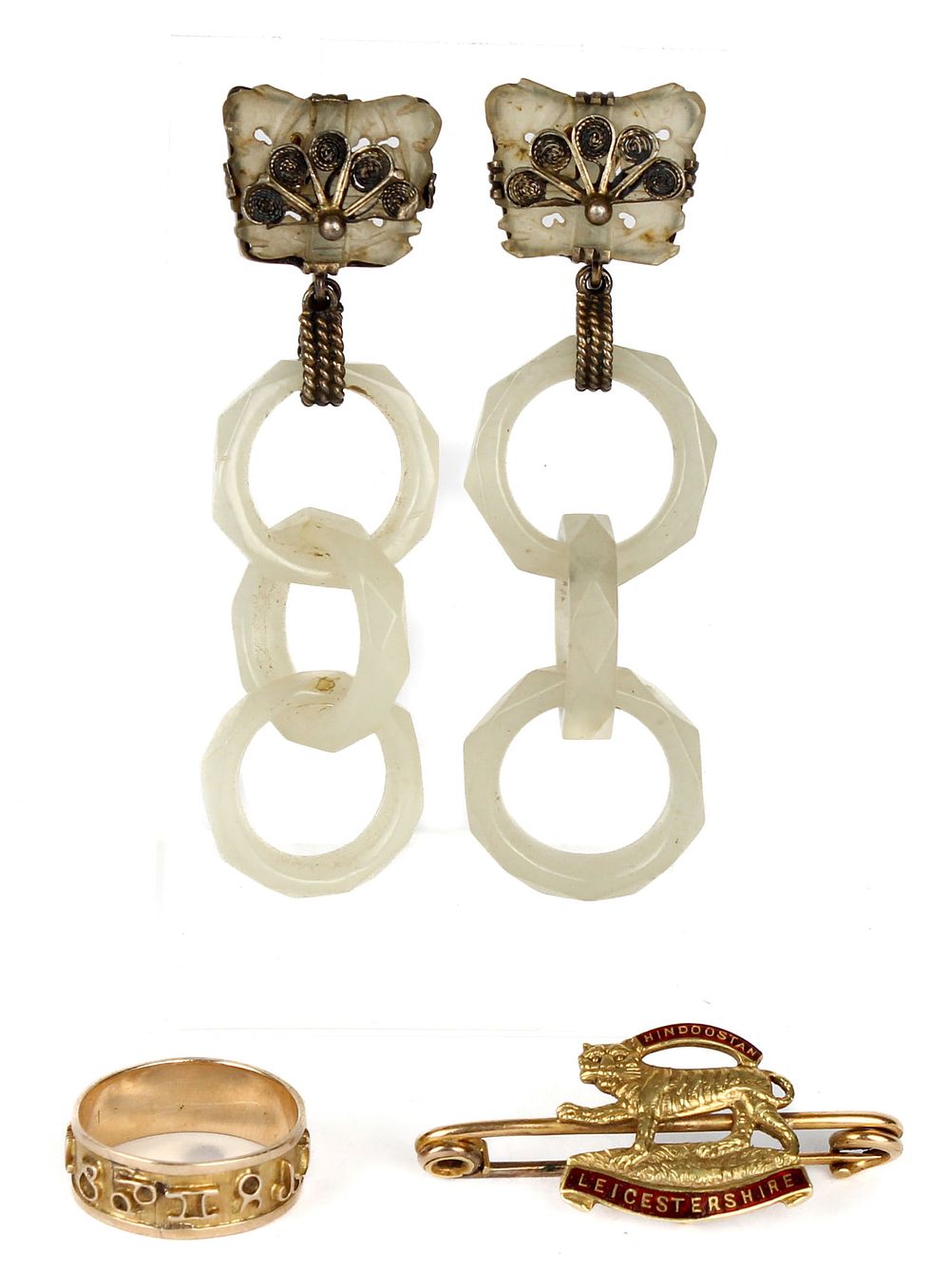 A WWI 15K Gold Hindoostan Leicestershire Tie Pin Or Cap Badge And A Gold Zodiac Ring. Description 